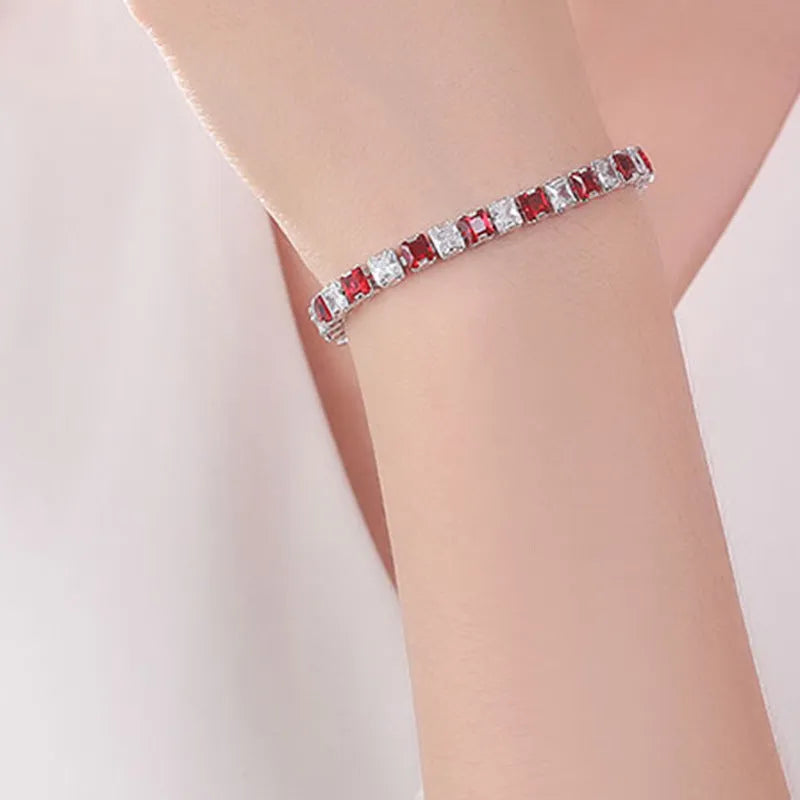 Electroplated real platinum women's bracelet with square diamond geometric design and gang drill details.