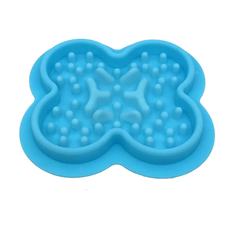 A blue silicone pet licking mat with a textured surface and non-slip base for slow feeding cats and dogs.