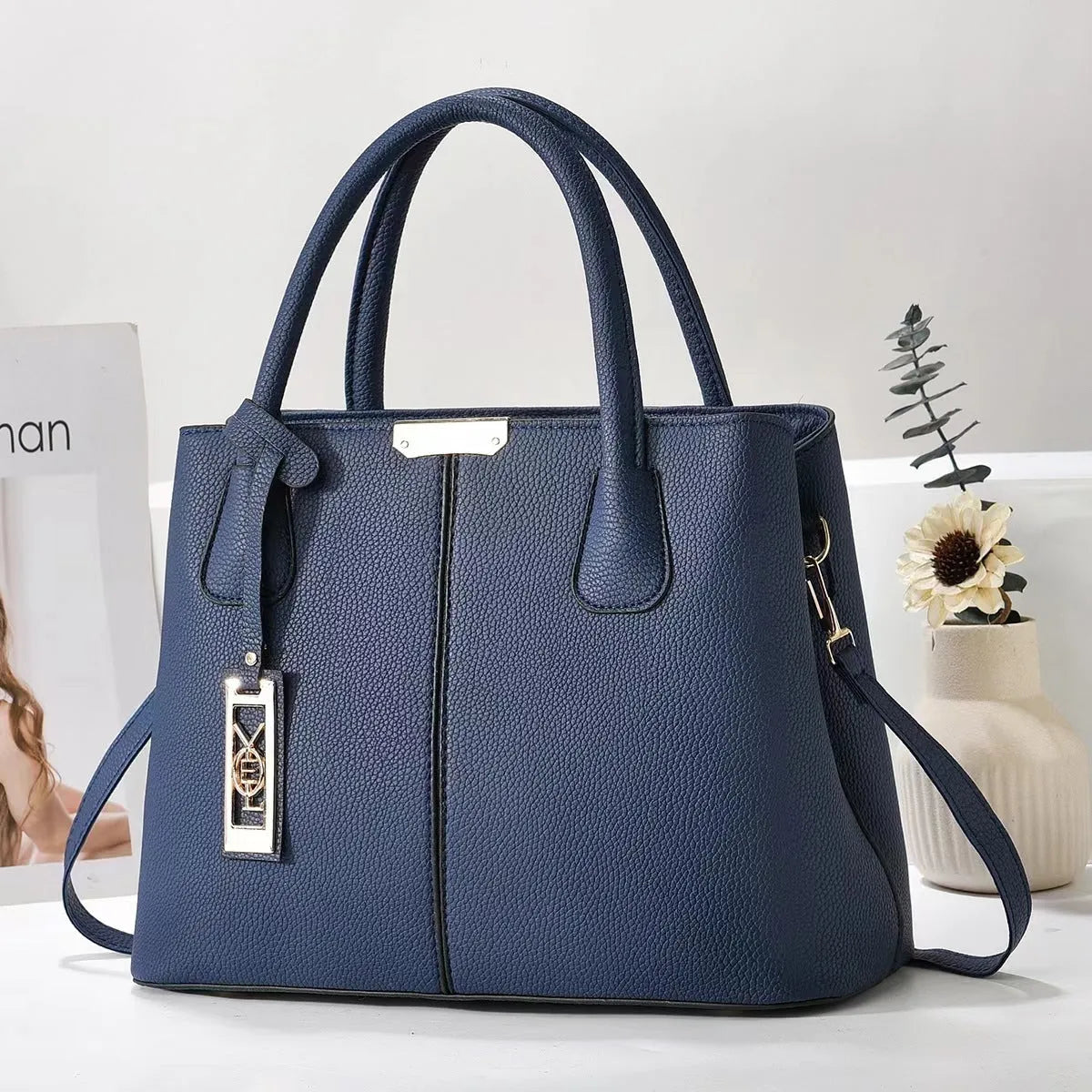 Soft PU women's shoulder bag in horizontal square shape with leather strap, available in multiple colours