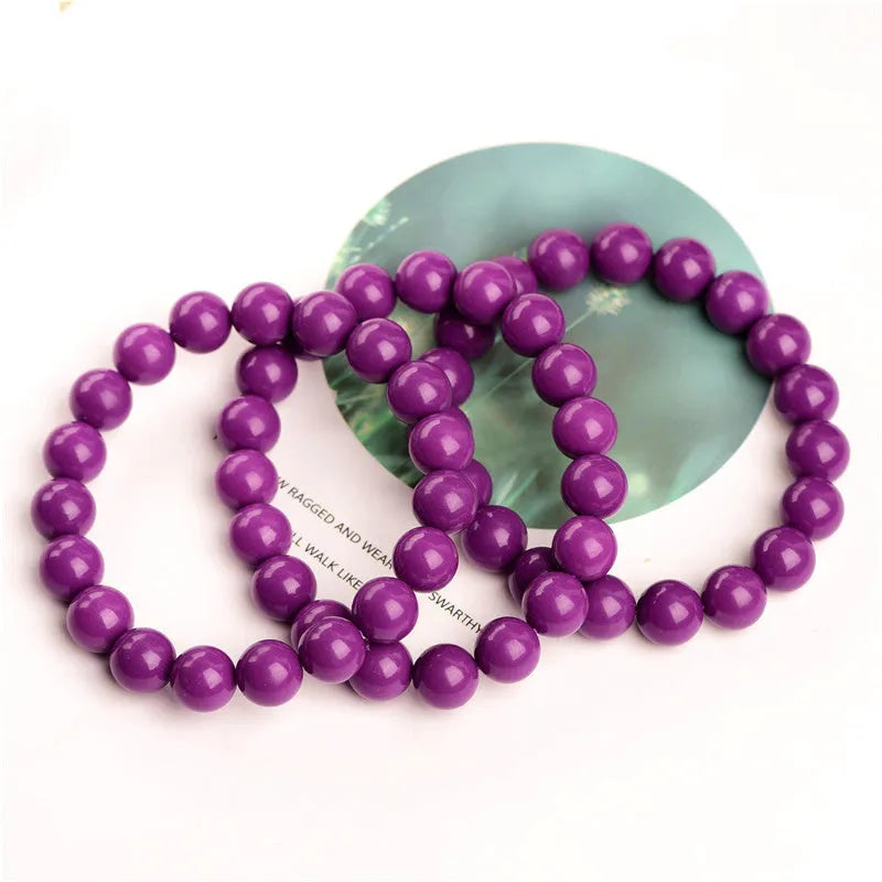 Jiuya purple mica crystal bracelet in 5A grade on a wrist.