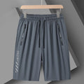 Men's black quick-dry loose fit sports shorts with elastic waistband on size chart