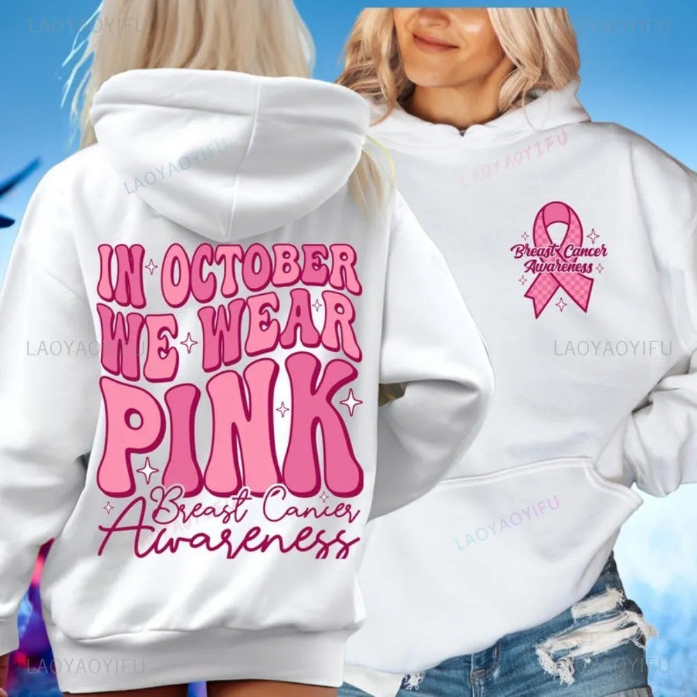 Breast Cancer Awareness pullover hoodie with retro art print and side seam pockets, shown in pink.