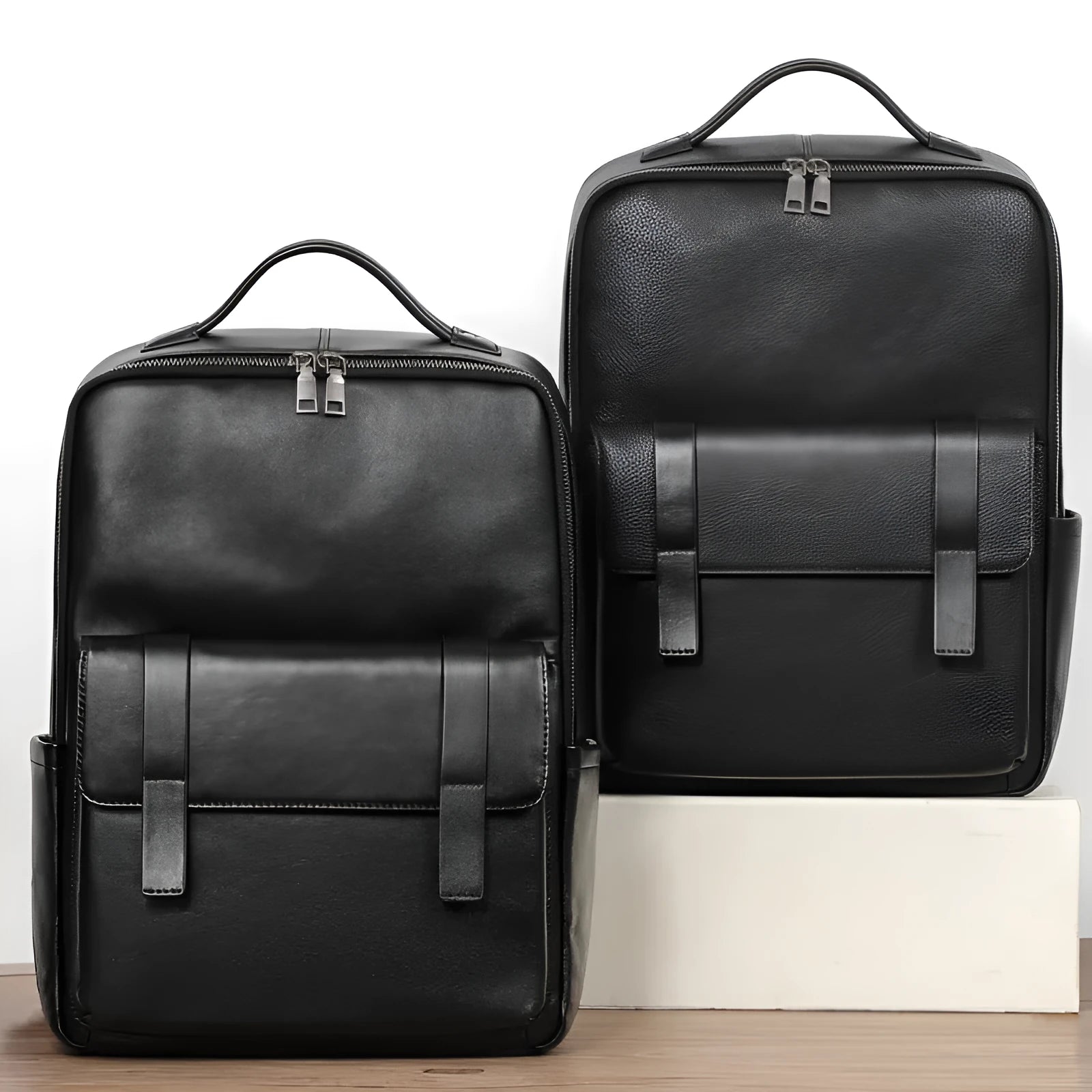 Men's black genuine leather computer backpack with 36-55L capacity and physiological curve back plate