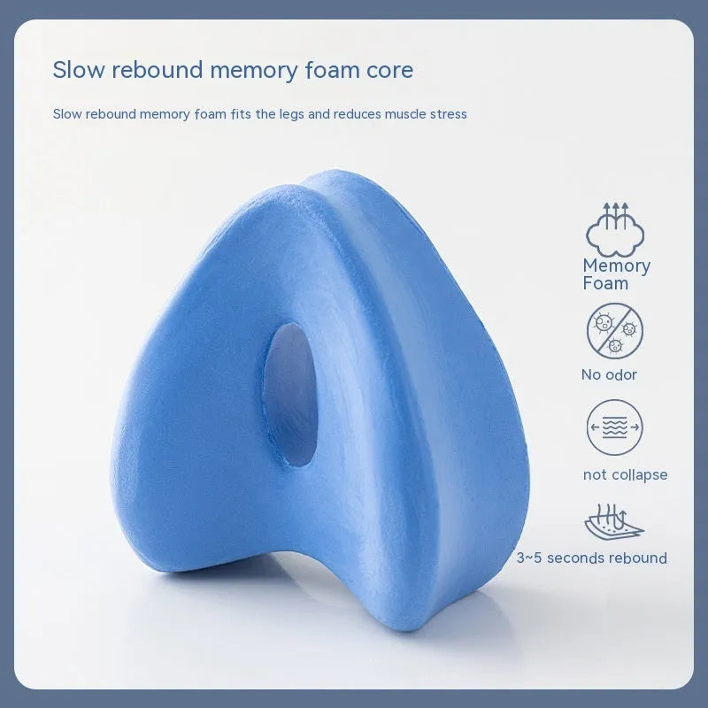 Heart-shaped memory foam leg pillow in dark blue jacquard colour, 25x23x13cm dimensions