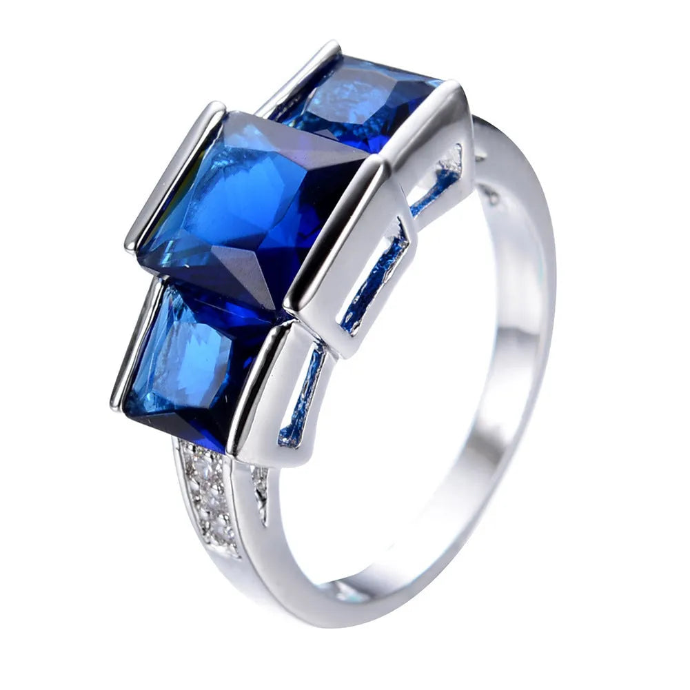 Copper electroplated colourful ring ornament in geometric design showing multiple colour options