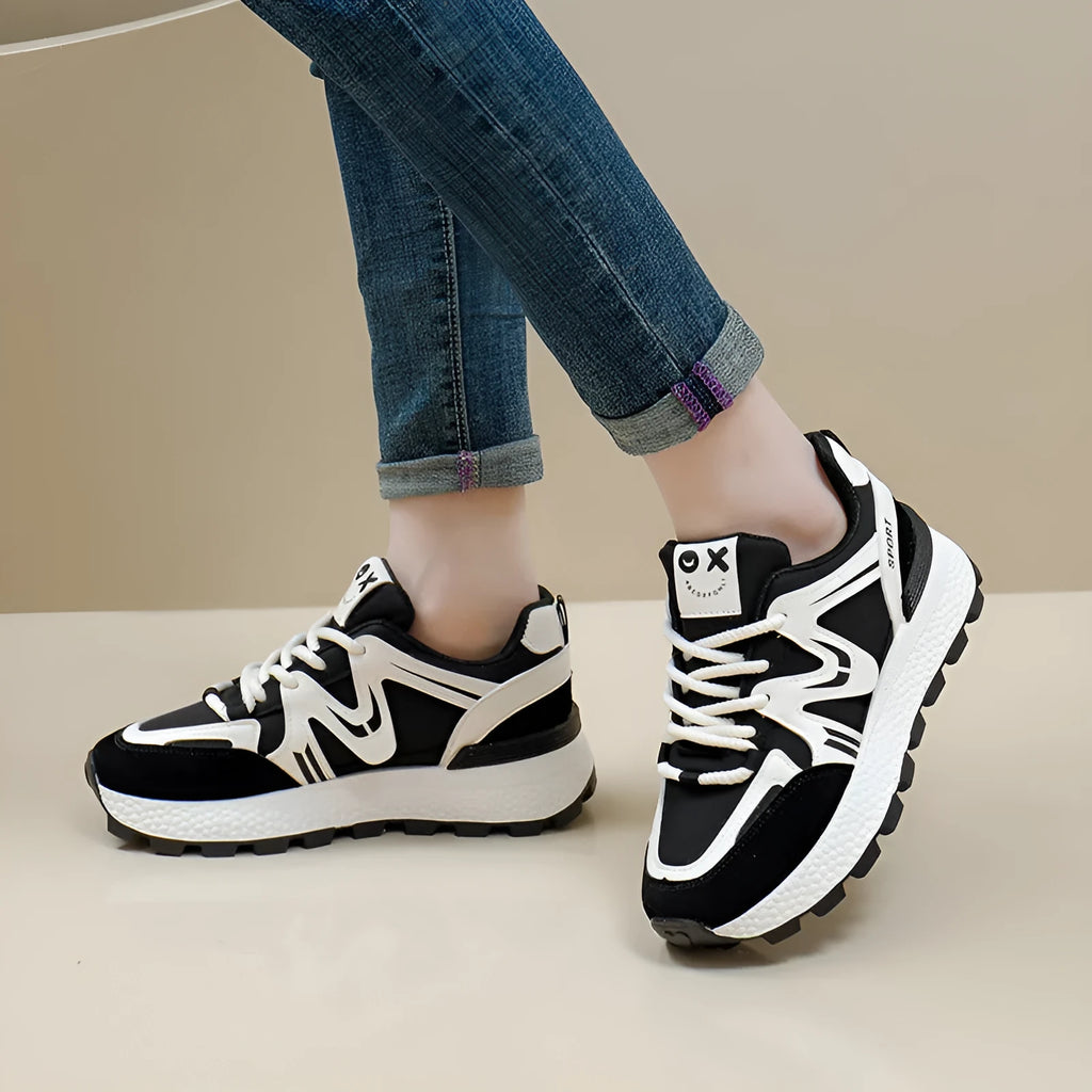 Women's lace-up casual sports shoes in artificial PU with cotton lining, round toe and flat heel design
