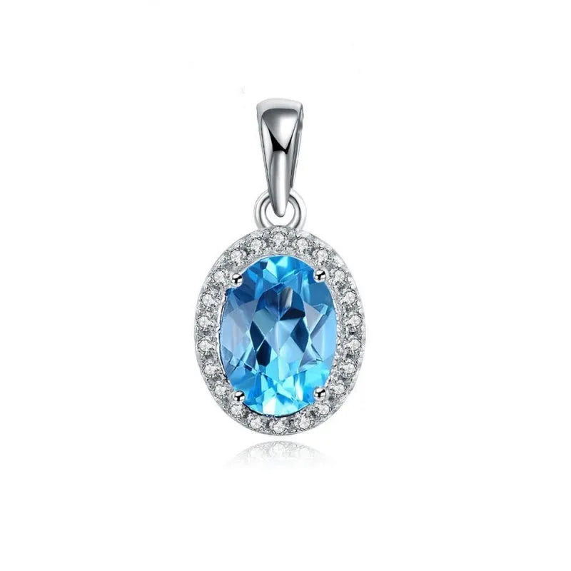 925 sterling silver jewellery set with blue topaz gems including earrings, ring, necklace and pendant