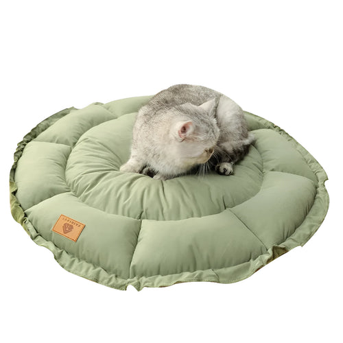 Grey and green reversible donut-shaped pet bed for cats and small dogs, shown in small, medium, and large sizes.