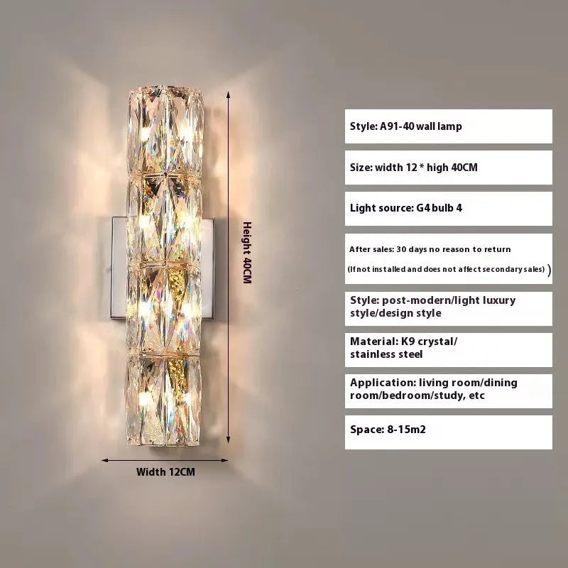 Slim crystal and stainless steel wall lamp with LED light on a wall.