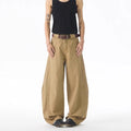 Men's brown loose fit casual jeans with straight leg design and button fly opening