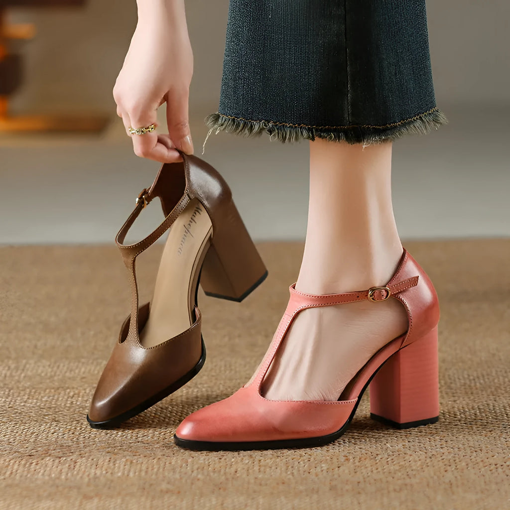 Women's dark brown hollow-out pointed toe buckle heels made from genuine cowhide leather.