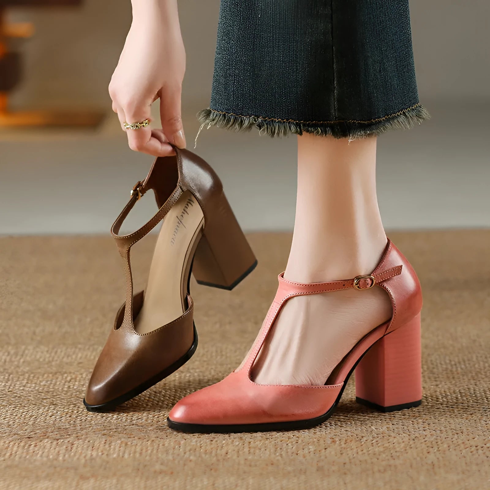 Women's dark brown hollow-out pointed toe buckle heels made from genuine cowhide leather.