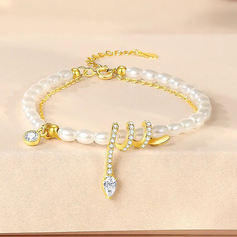 925 silver bracelet with geometric pearl snake design in electroplated gold tone