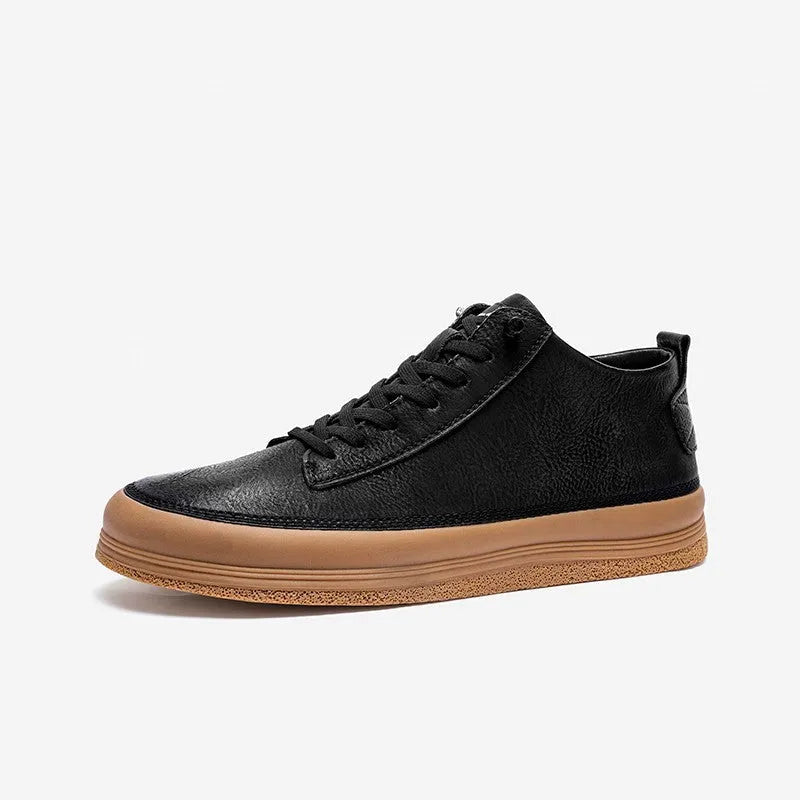 Men's black leather casual shoes with white stitching and lace closure on a white rubber sole