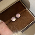 Chinese retro style chalcedony stud earrings with geometric round egg surface and four-claw stone setting
