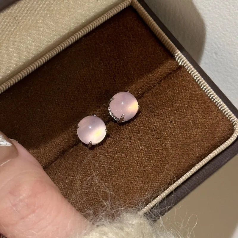 Chinese retro style chalcedony stud earrings with geometric round egg surface and four-claw stone setting