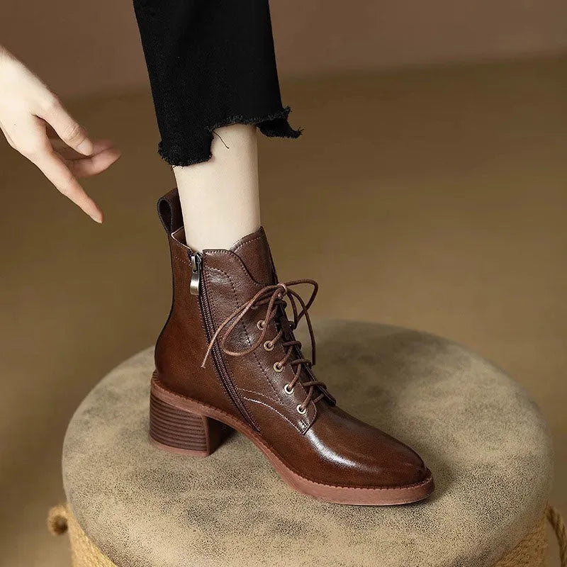 Women's black pointed-toe ankle boots with 5.5cm heel and artificial PU upper material
