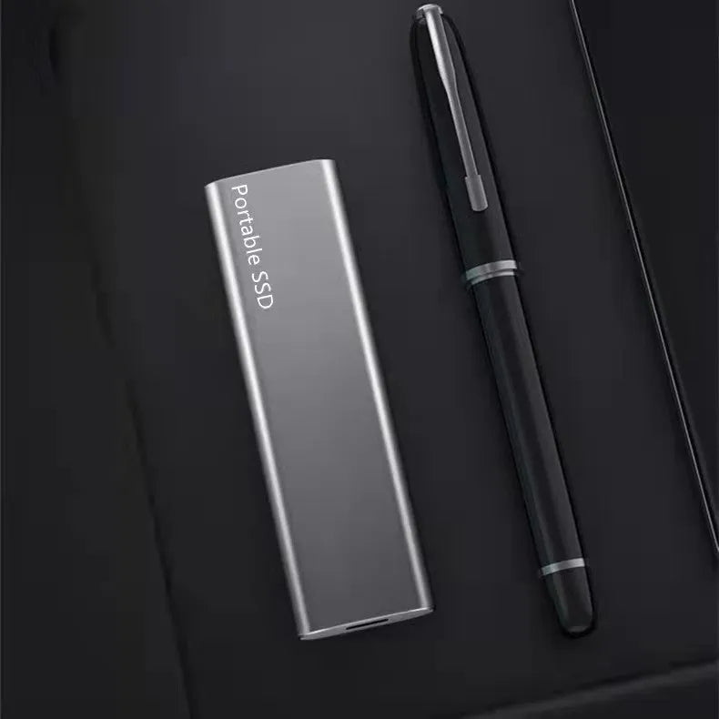 Red ultra-thin metal mobile SSD portable hard drive for high-capacity storage.