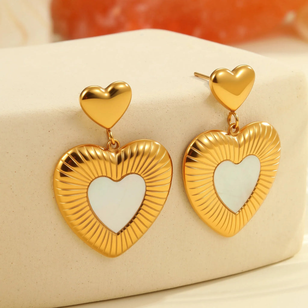 Heart-shaped stainless steel women's earrings with gold electroplated finish and love motifs