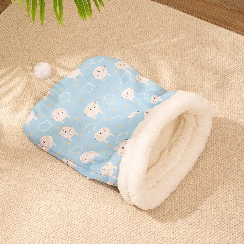 Flannel cat sleeping bag nest bed in blue rabbit print, size 50 cm by 40 cm.