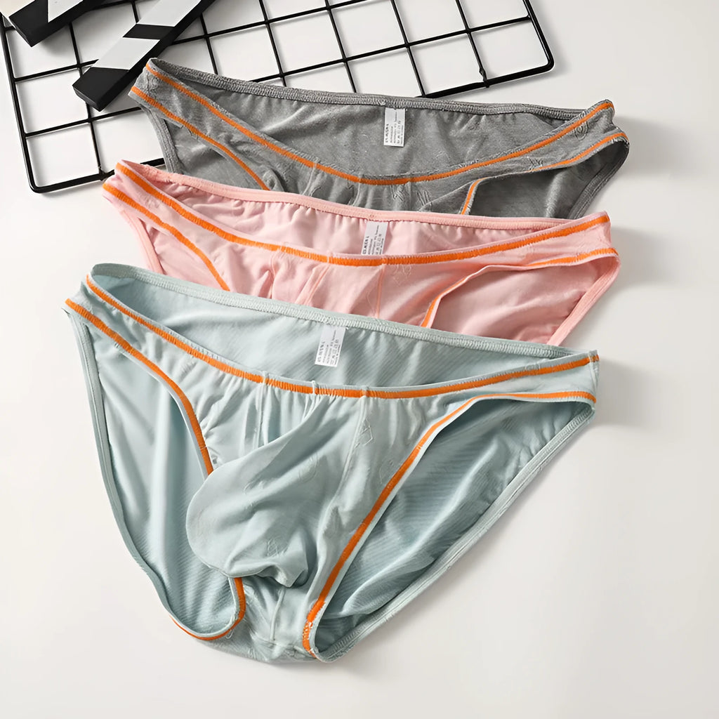 Men's modal knitted underwear in butt-lift hip design shown in multiple colour options.