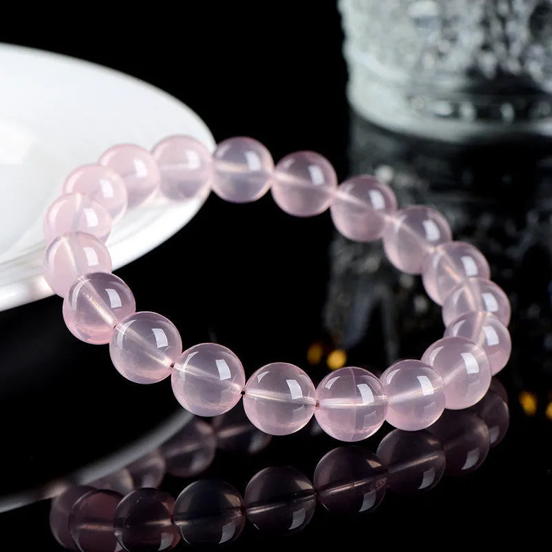 Women's natural starlight crystal bracelet with round pink beads in various size options