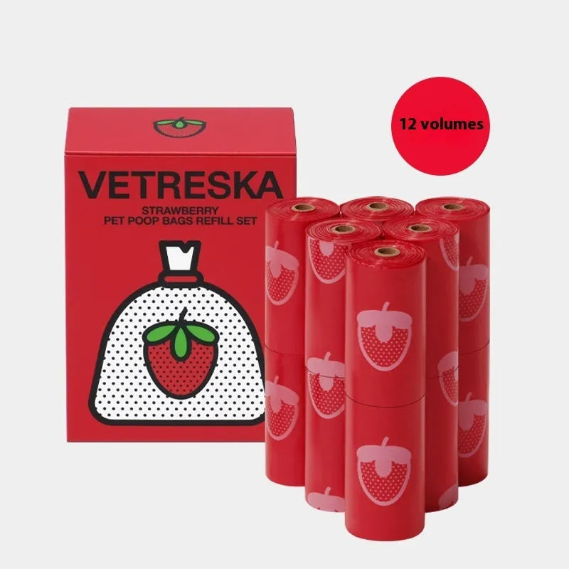 Refillable plastic dog poo bag dispenser capsule with a roll of scented biodegradable bags in strawberry design.