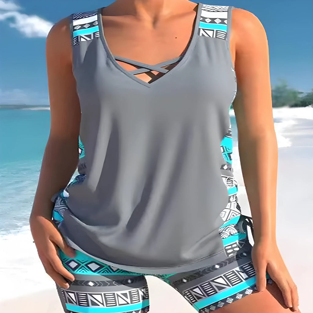 Women's blue printed lace two-piece swimsuit set showing top and shorts
