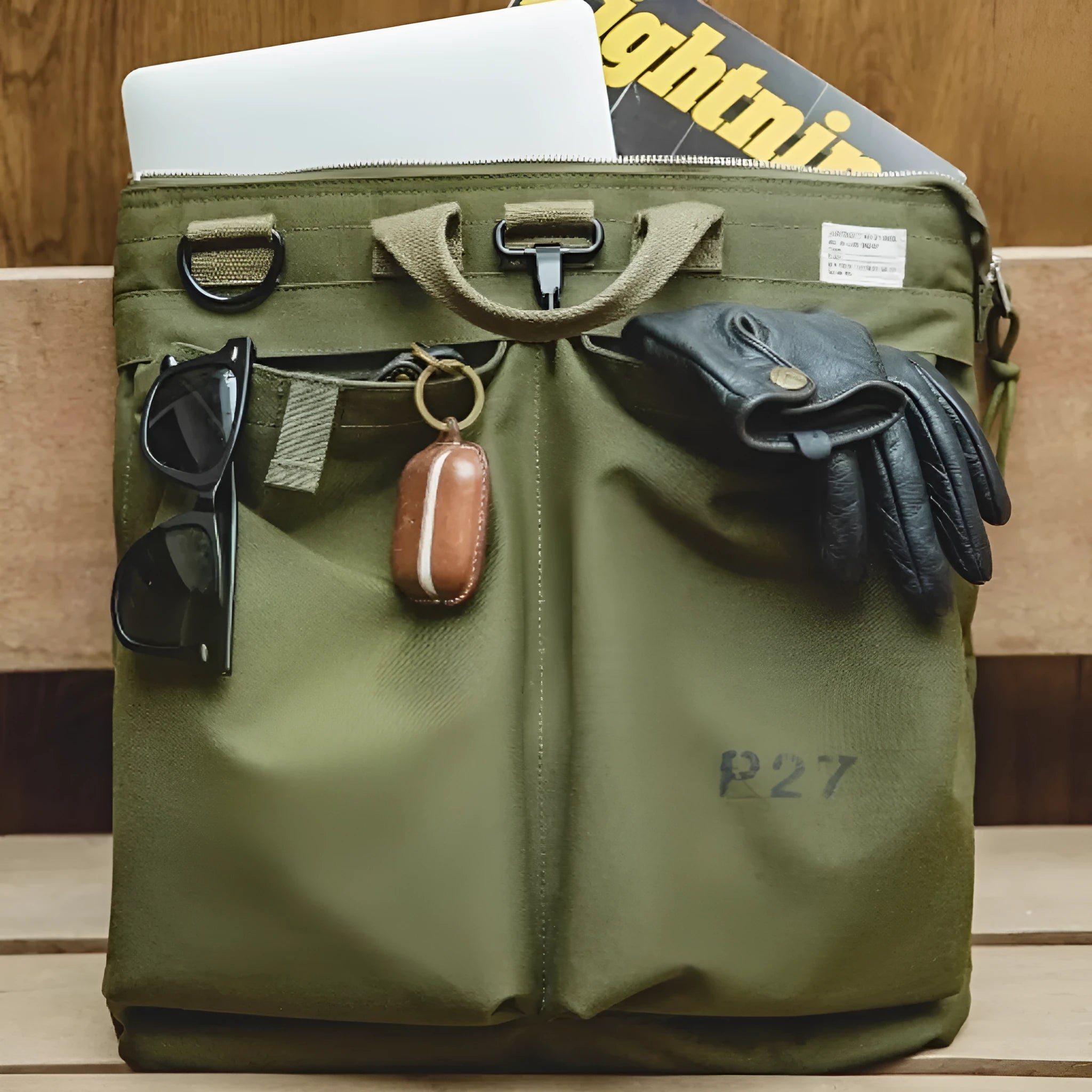 Marden Tooling charcoal black nylon canvas messenger bag with shoulder strap shown open.