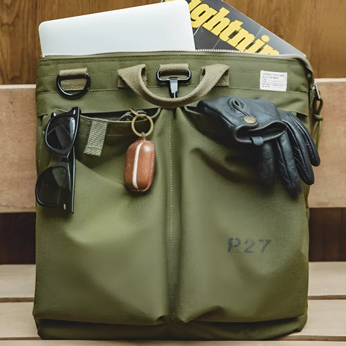 Marden Tooling charcoal black nylon canvas messenger bag with shoulder strap shown open.