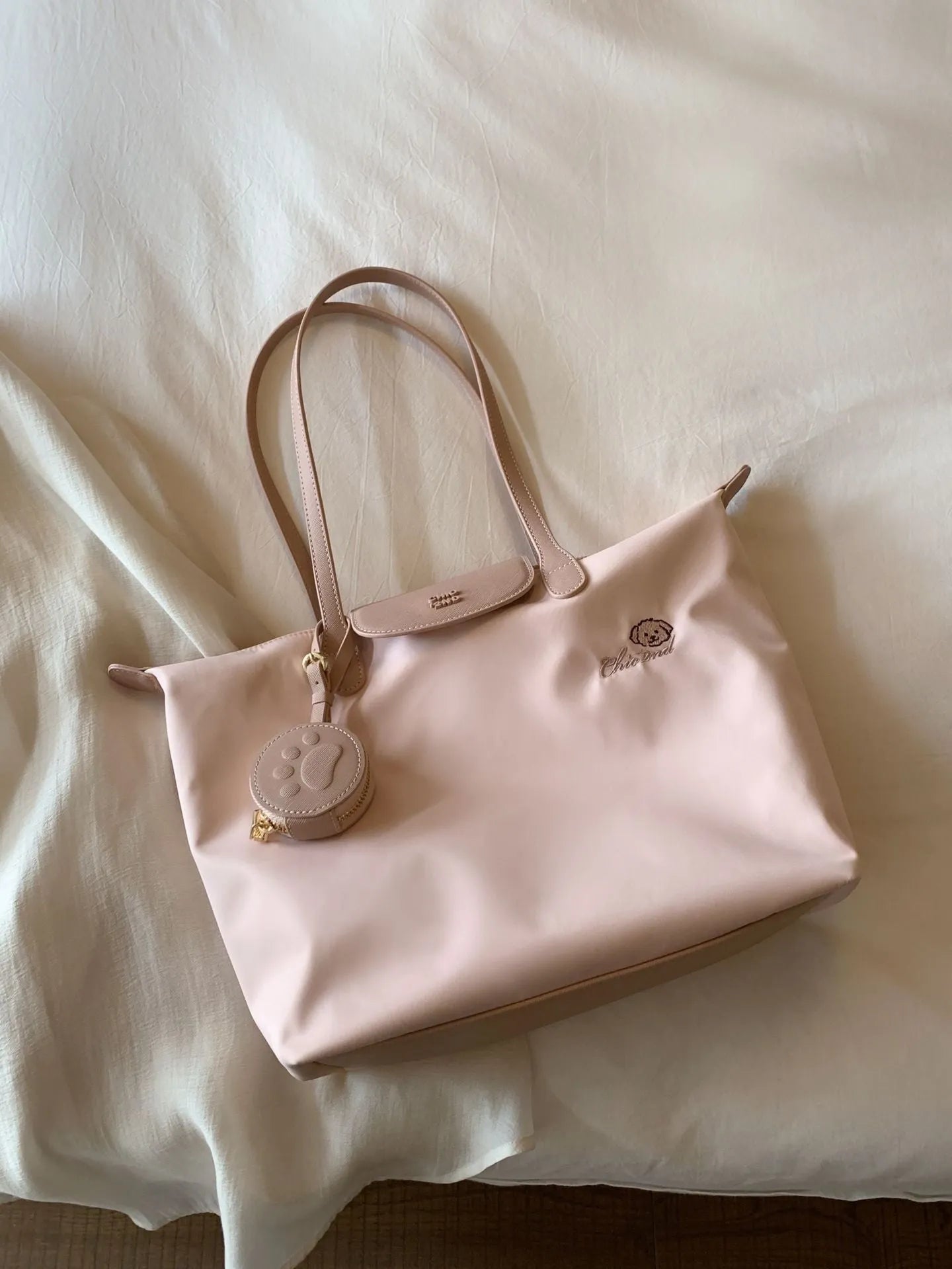 Oxford cloth tote bag with sandwich pockets showing pink colour option and mobile phone compartment