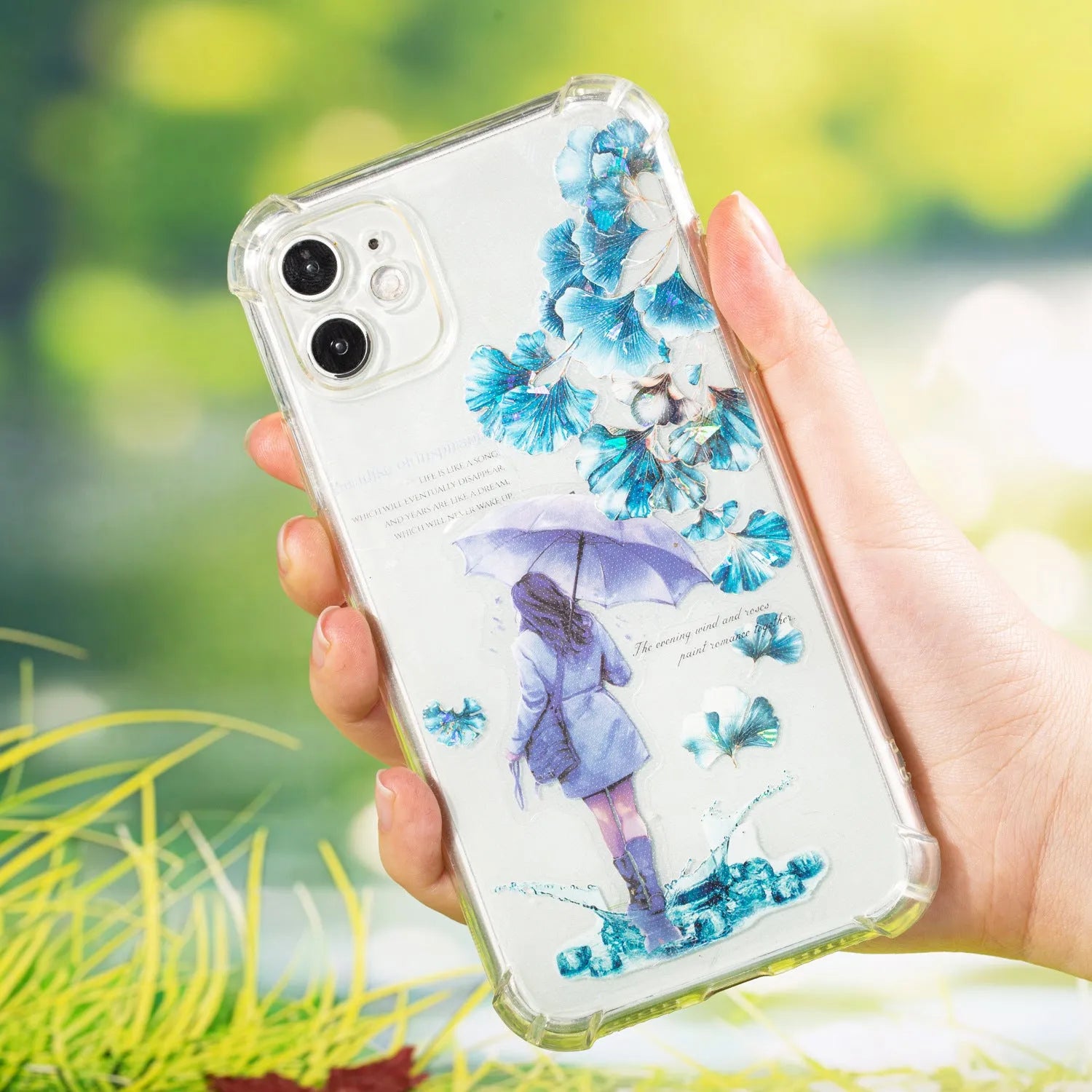 Six rolls of nature-themed decorative stickers showing gentle ginkgo, maple leaf, and blue fallen leaves designs.