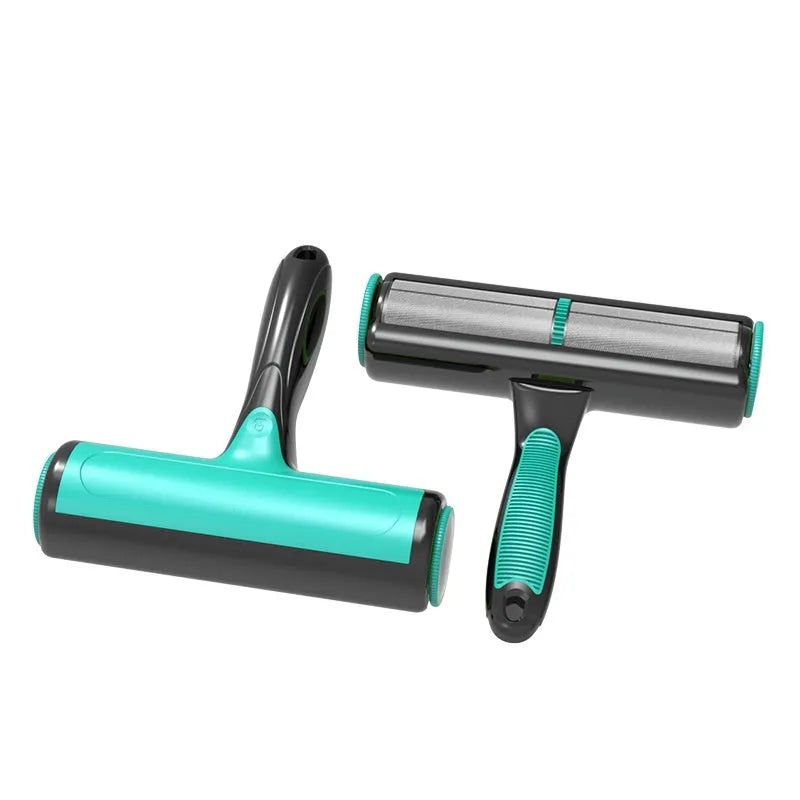 Green manual pet hair lint roller with sticky brush on ABS plastic handle.
