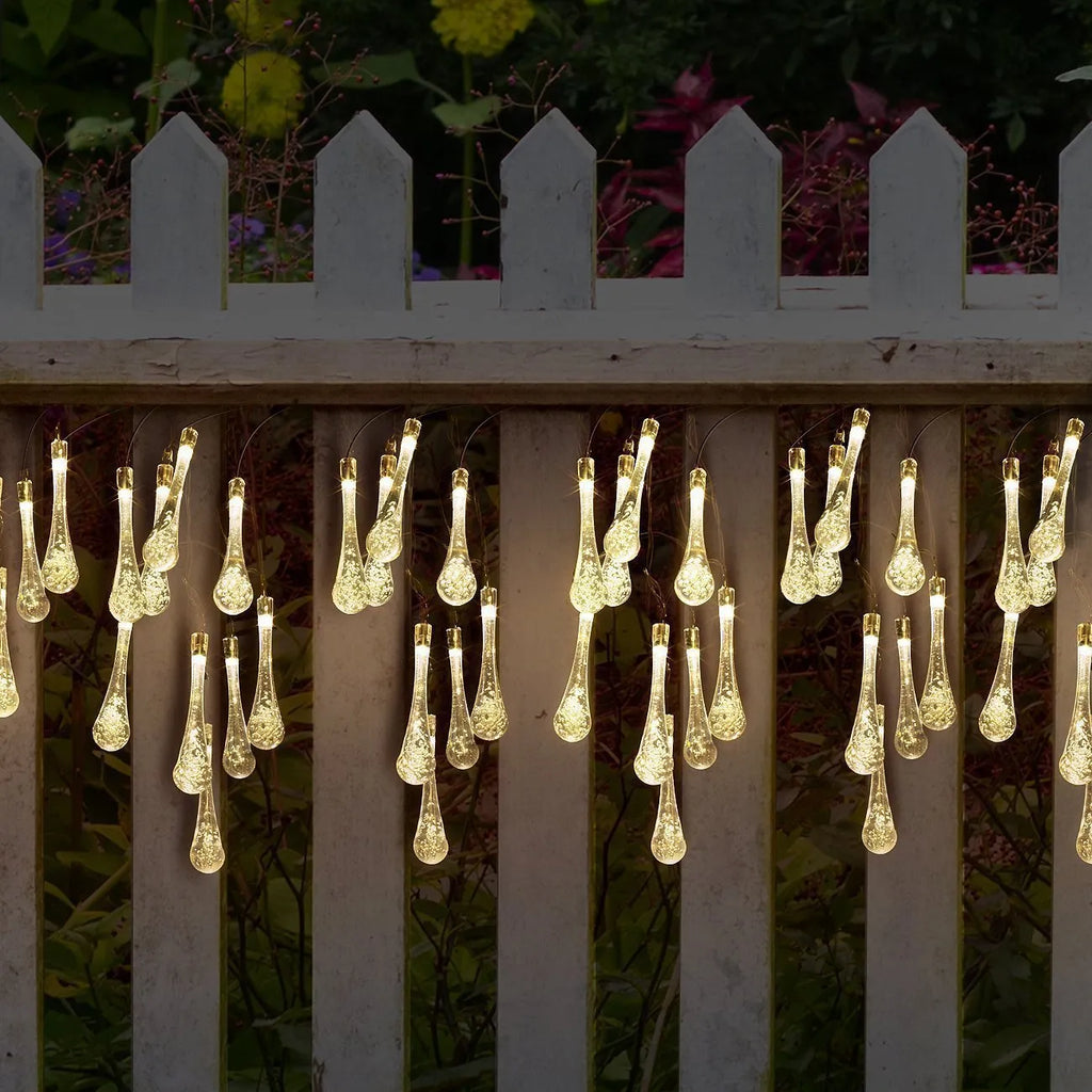 Solar-powered LED water drops string lights with 30 bulbs on 6.5 metre waterproof cable for outdoor garden use