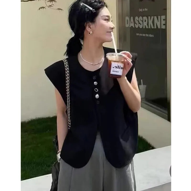 Women's loose-fit polyester vest in milky white with a pocket, shown on a hanger.