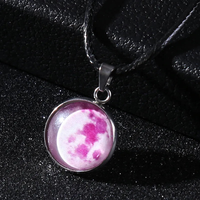 Luminous alloy unisex necklace with organic glass constellation pendant on adjustable glass chain.