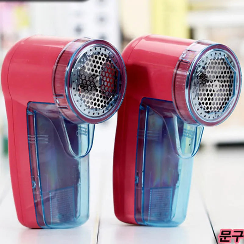 Portable electric clothing lint remover unit in a compact size.