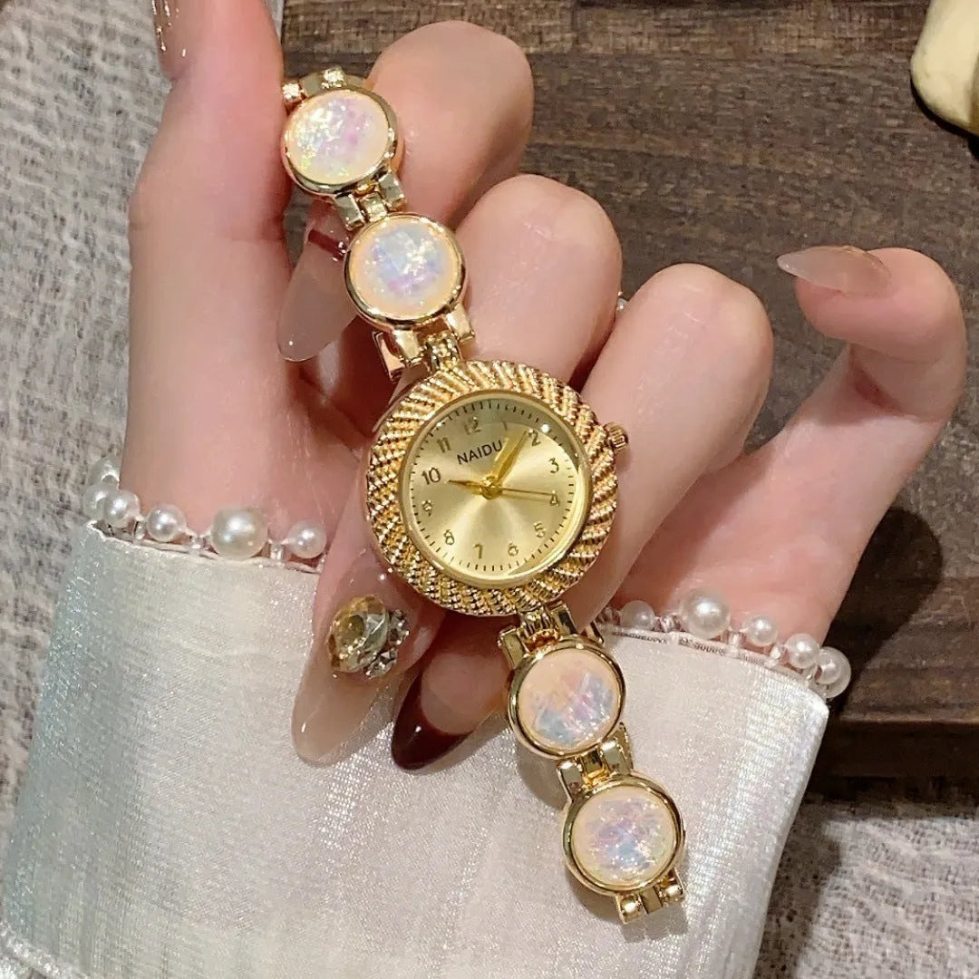 Women's 25mm round quartz watch in zinc alloy case showing six colour options