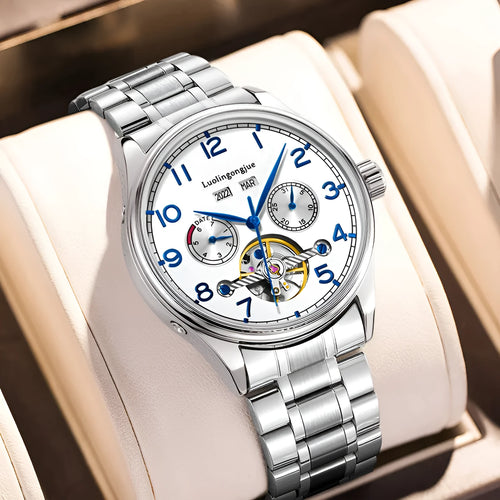 Men's stainless steel business watch with leather strap and sapphire glass, showing transparent case back.