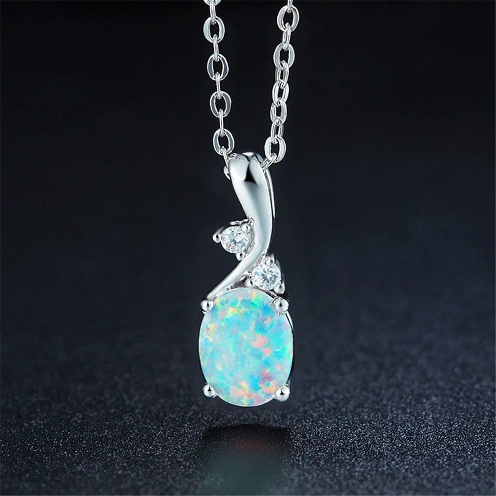 Water drop shaped opal pendant necklace on adjustable O chain in rose gold or white