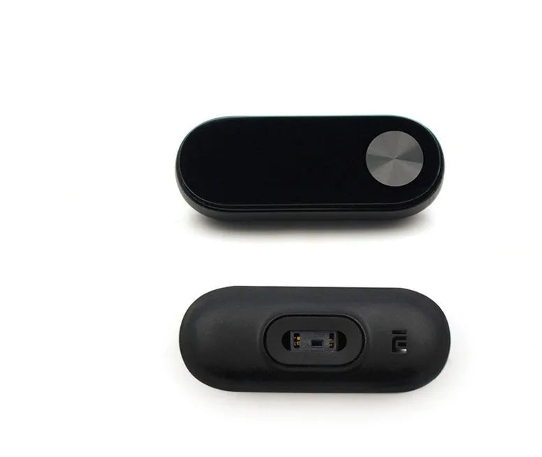 Xiaomi Mi Band 2 black fitness tracker with OLED screen on a grey wrist strap.