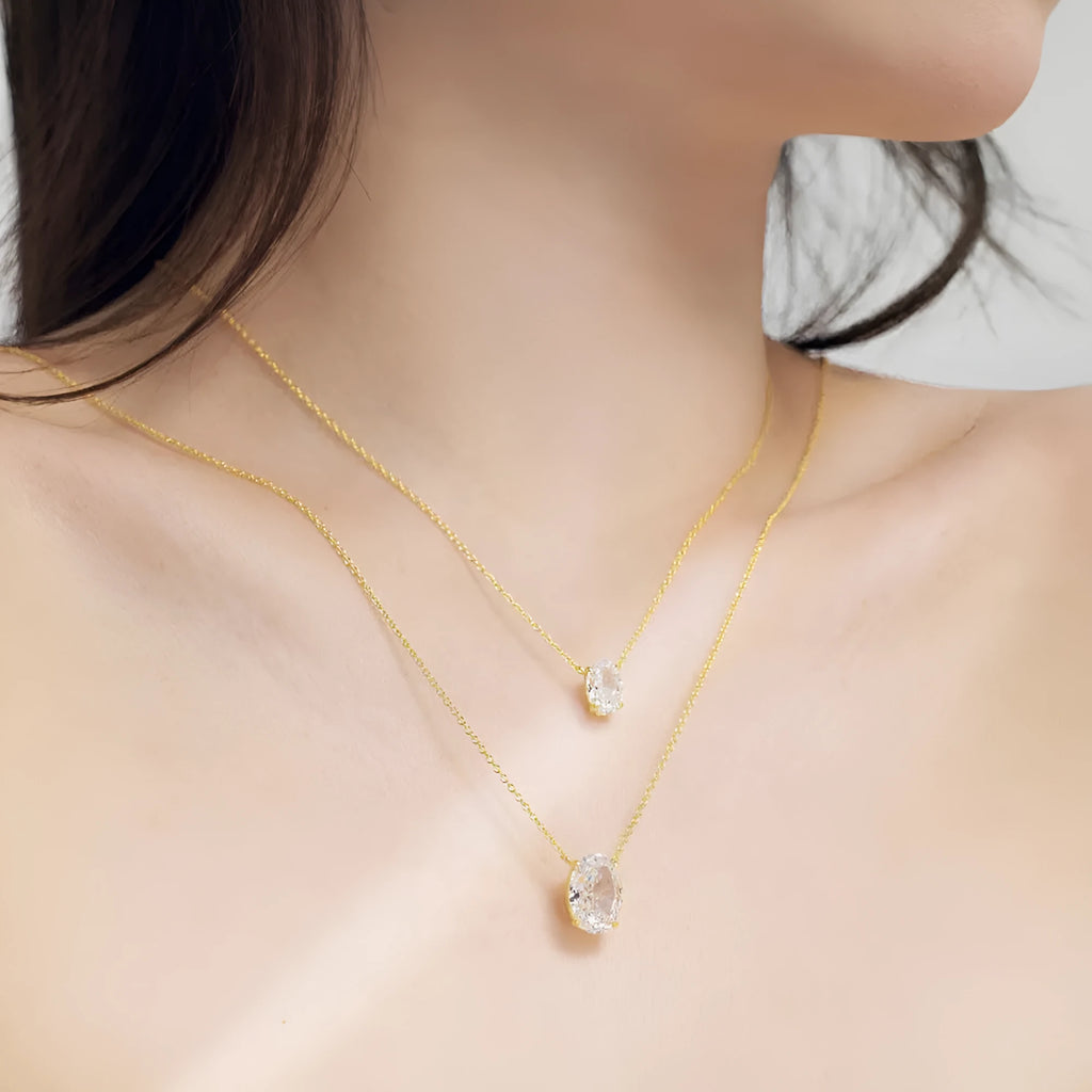 S925 sterling silver necklace with geometric oval ice flower pendant in gold or platinum finish.