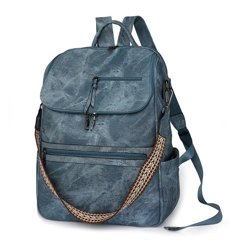 Retro college backpack with curved shoulder straps in multiple colour options including black, blue, grey, and coffee tones