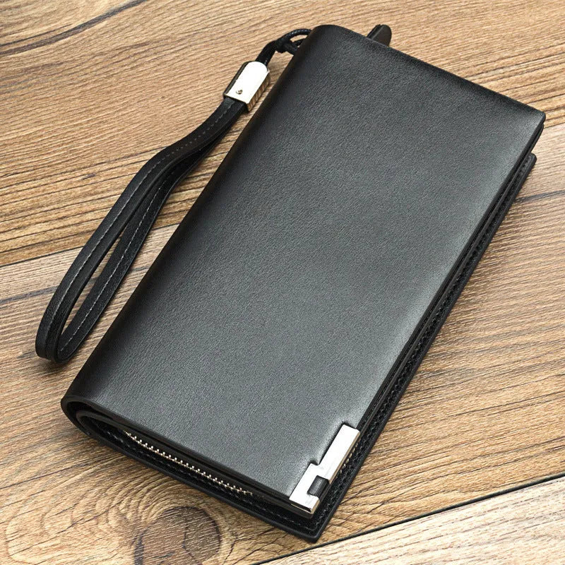 Men's long black PU leather wallet with a silver zipper closure laid flat.