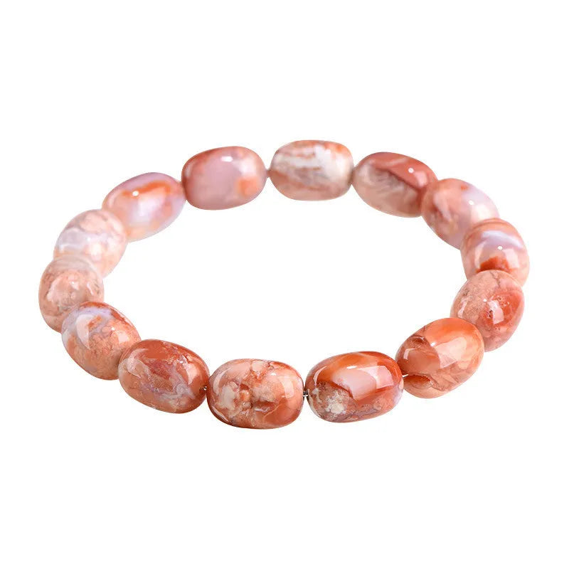 Natural cherry agate bracelet with barrel-shaped beads showing Ruyi geometric design
