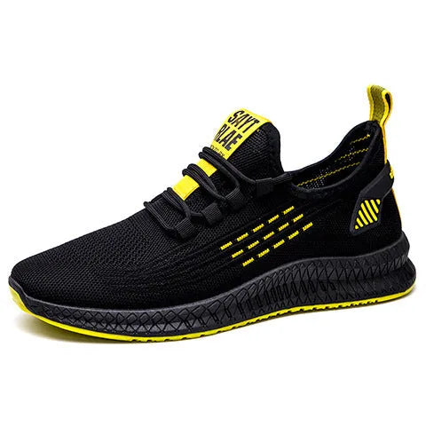 Men's black casual sports shoes with Flying Weave upper and flat low-heel profile.
