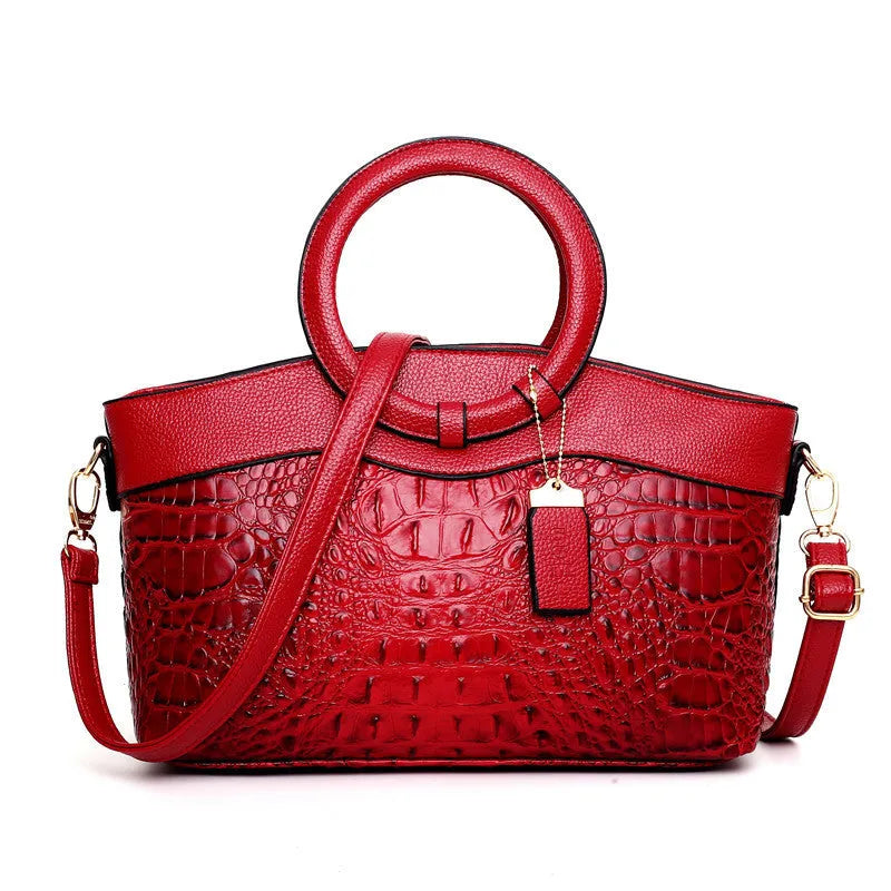 Fabric ladies handbag in multiple colours showing zipper compartment and internal organisation pockets