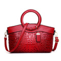 Fabric ladies handbag in multiple colours showing zipper compartment and internal organisation pockets