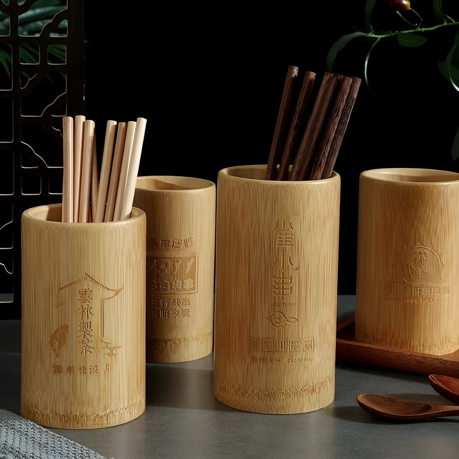 Creative bamboo chopsticks holder for portable household utensil storage.
