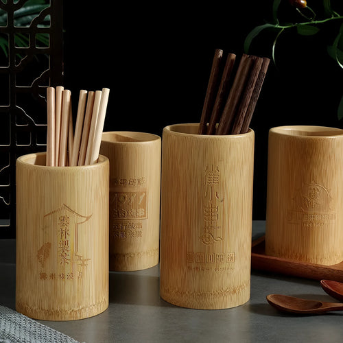 Creative bamboo chopsticks holder for portable household utensil storage.
